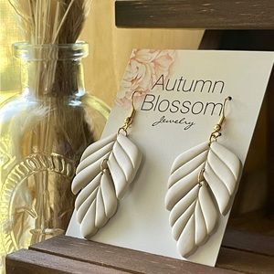 Handmade light beige leaf shaped earrings
